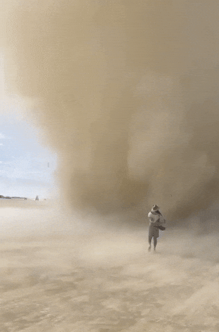 Shocking Daredevil Walking Through Dust Storm GIF
