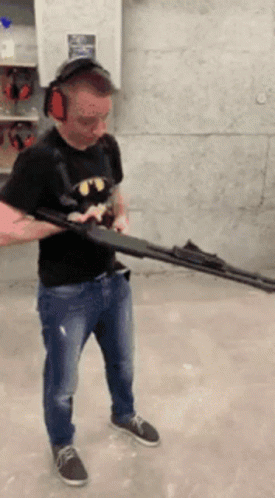 Man With Shotgun Aiming For Accuracy GIF