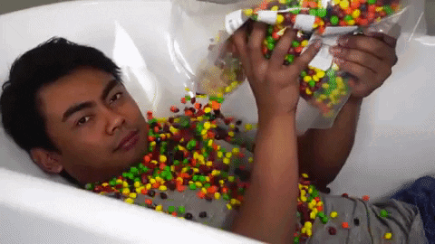 Shower Skittles Candy On The Tub GIF