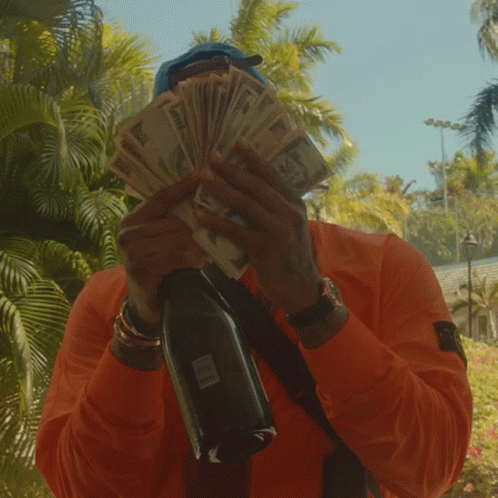 Showing Off Big Money GIF