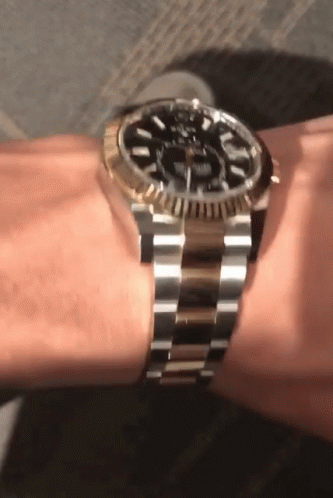 Showing Rolex Logo Watch GIF