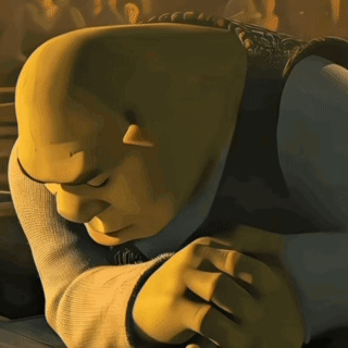 Shrek From Shrek Is Laying Down With His Head On His Hands GIF