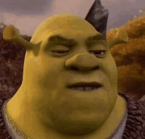 Shrek From Shrek Is Making A Funny Face While Looking At The Camera . GIF