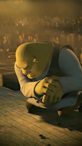 Shrek From The Movie Shrek Is Kneeling Down On The Floor GIF