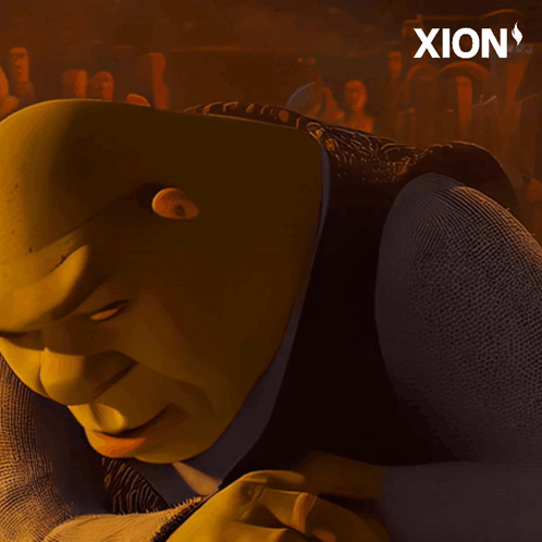 Shrek From The Movie Shrek Is Laying Down And Looking At The Camera GIF