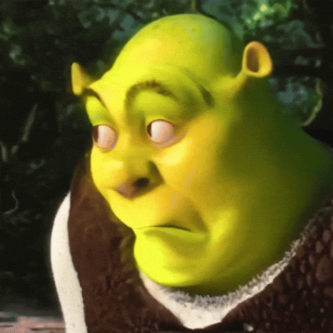 Shrek From The Movie Shrek Is Making A Funny Face With His Eyes Closed GIF
