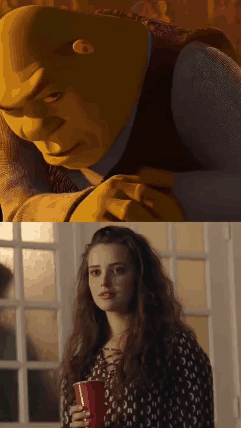 Shrek Holding Red Cup Next to Girl