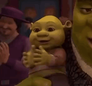 Shrek Holding Stuffed Shrek Doll