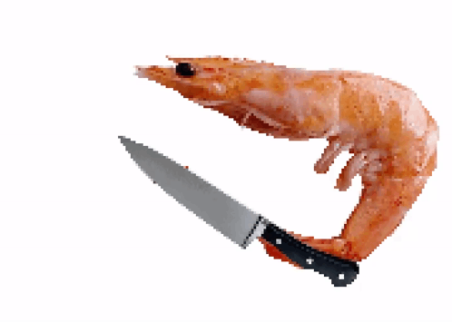 Shrimp With Knife Sticking Out of Tail