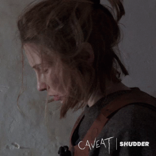 Shudder Caveat Scared Lady GIF
