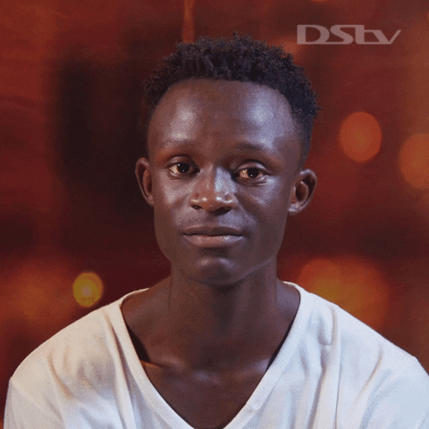 Shy Kid From Zambia Shaking Head GIF