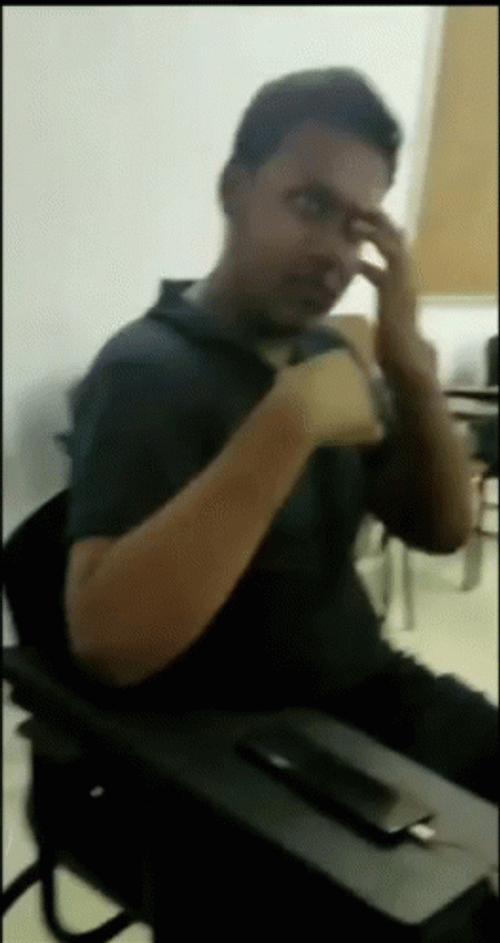 Sign Of The Cross In A Classroom GIF
