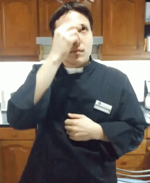 Sign Of The Cross In A Priest Cosplay GIF