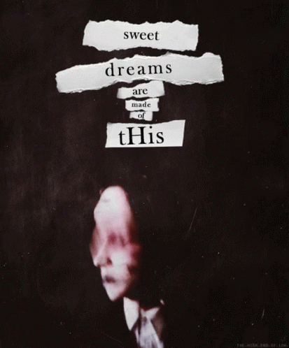 Sign Saying Hopes And Dreams On Wooden Table GIF