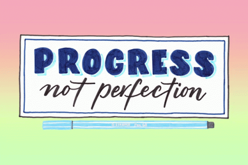 Sign Saying Progress Not Perfection Next To Blue Stabilo Pen GIF