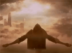 Silhouette Man Arms Outstretched In Sky GIF