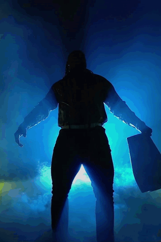 Silhouette Man Holding Large Axe