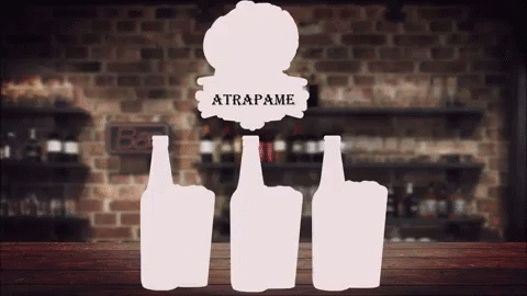 Silhouette of Bottles With Atrapame Sign