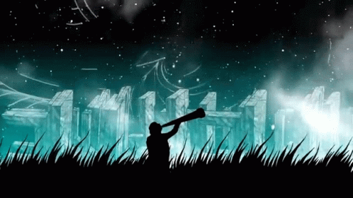 Silhouette of Man Holding Megaphone in Front of City at Night