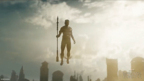 Silhouette of Man Holding Spear Wakanda Forever
