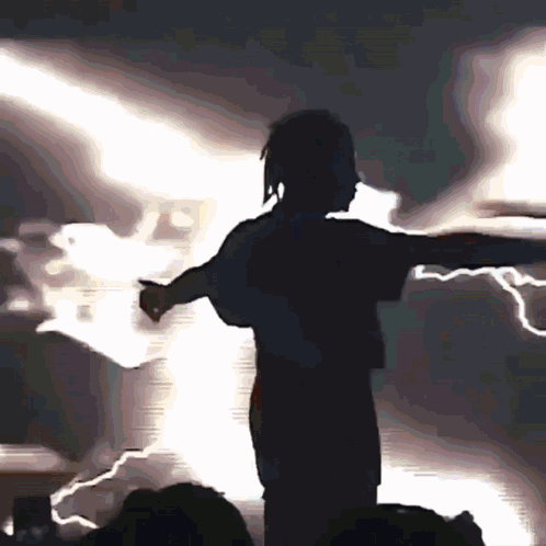 Silhouette of Person in Lightning Storm