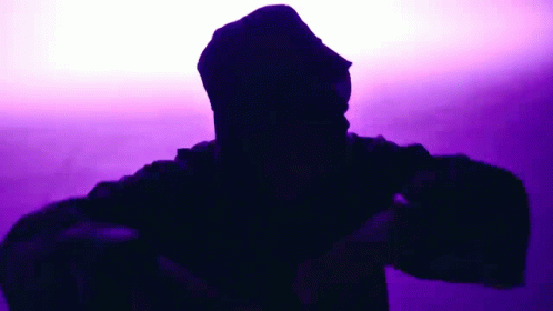 Silhouette of Person Wearing Hat