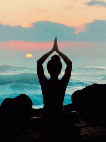 Silhouette Woman Meditating in Lotus Position
