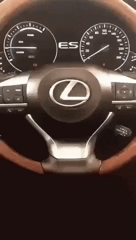 Silver Lexus on Snowy Road