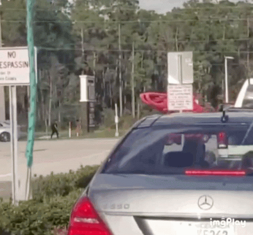 Silver Mercedes Parked In Front Of No Espassin Sign GIF