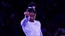Simone Biles Mic Drop Pose Gymnastics GIF