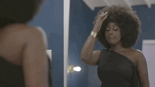 Singer Amara La Negra Fixing Afro Hair GIF