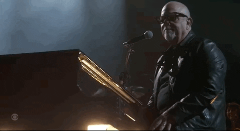 Singer Billy Joel Playing Piano GIF