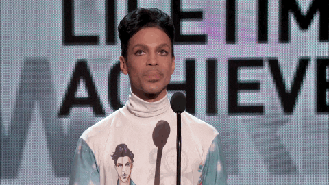 Singer-songwriter Prince Bow And Blowing Kiss GIF