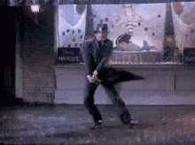 Gene Kelly Singing In The Rain Umbrella GIF
