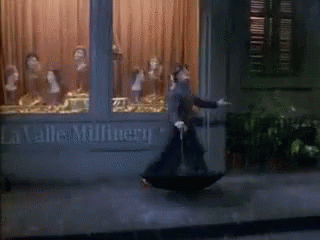 Cosmo Brown Singing In The Rain GIF