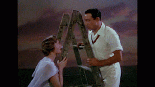 Gene Kelly Debbie Reynolds Ladder Scene Singing In The Rain GIF