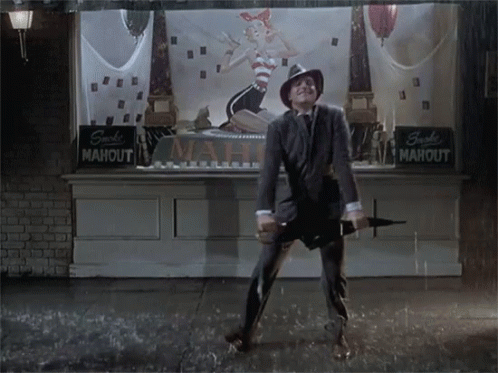 Gene Kelly Slow Dance Singing In The Rain GIF