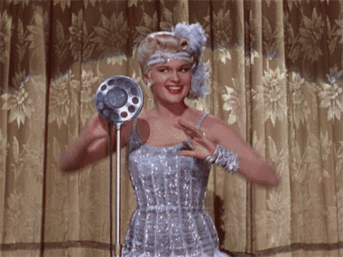 Lina Lamont Singing In The Rain GIF