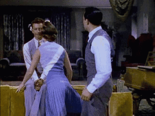 Kathy Selden Kissing Cosmo Brown Singing In The Rain GIF