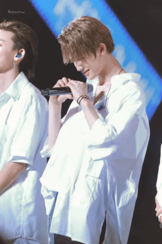 Singing Man in White Shirt, Another Man Watching