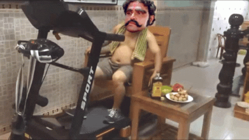 Sitting And Eating While Walking On Treadmill GIF