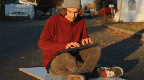 Sitting Man Doing Fast Typing GIF