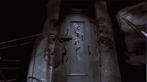 Skeleton Hanging on Door