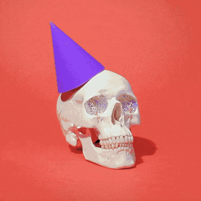 Skeleton Party Skull With Candles GIF