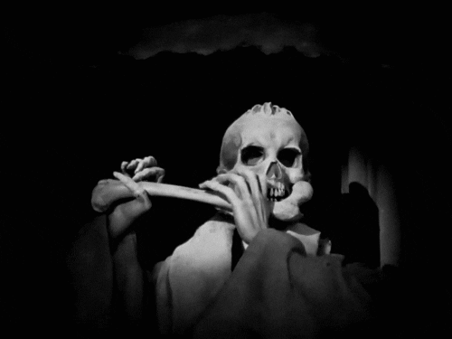 Skeleton Playing Flute With Bones GIF