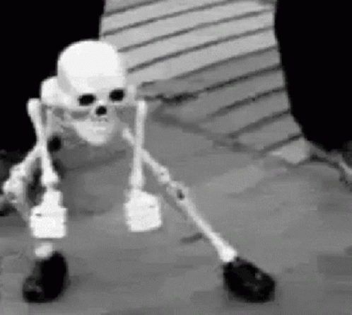 Skeleton With Crutches on Wooden Floor