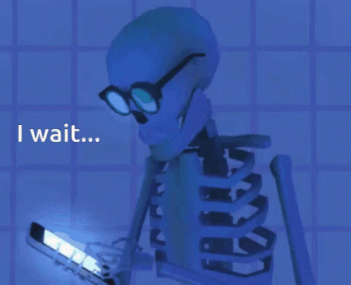 Skeleton With Glasses On Phone Saying I Wait GIF