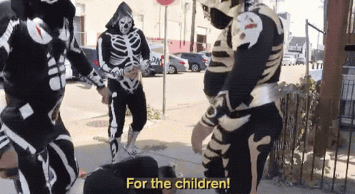 Skeletons Standing on Sidewalk Saying For the Children