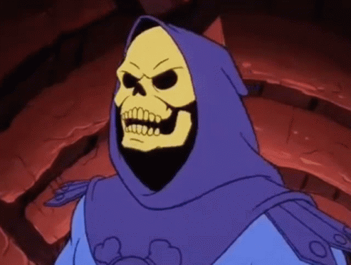 Skeletor From The Masters Of The Universe Is Wearing A Blue Robe And Hood GIF