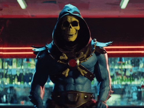 Skeletor Standing in Front of Bar With Red Light